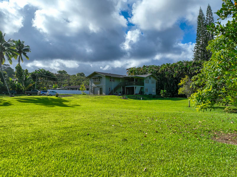 a view of a house with a big yard