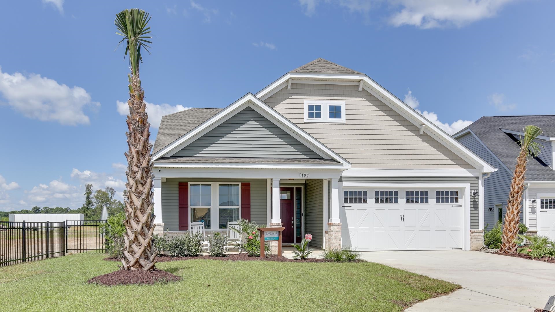 Craftsman house with a porch and a front yard