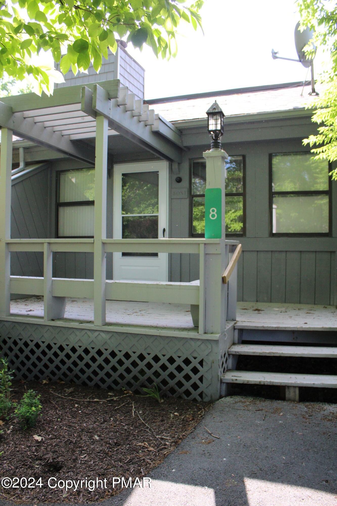 a front view of a house with a garage