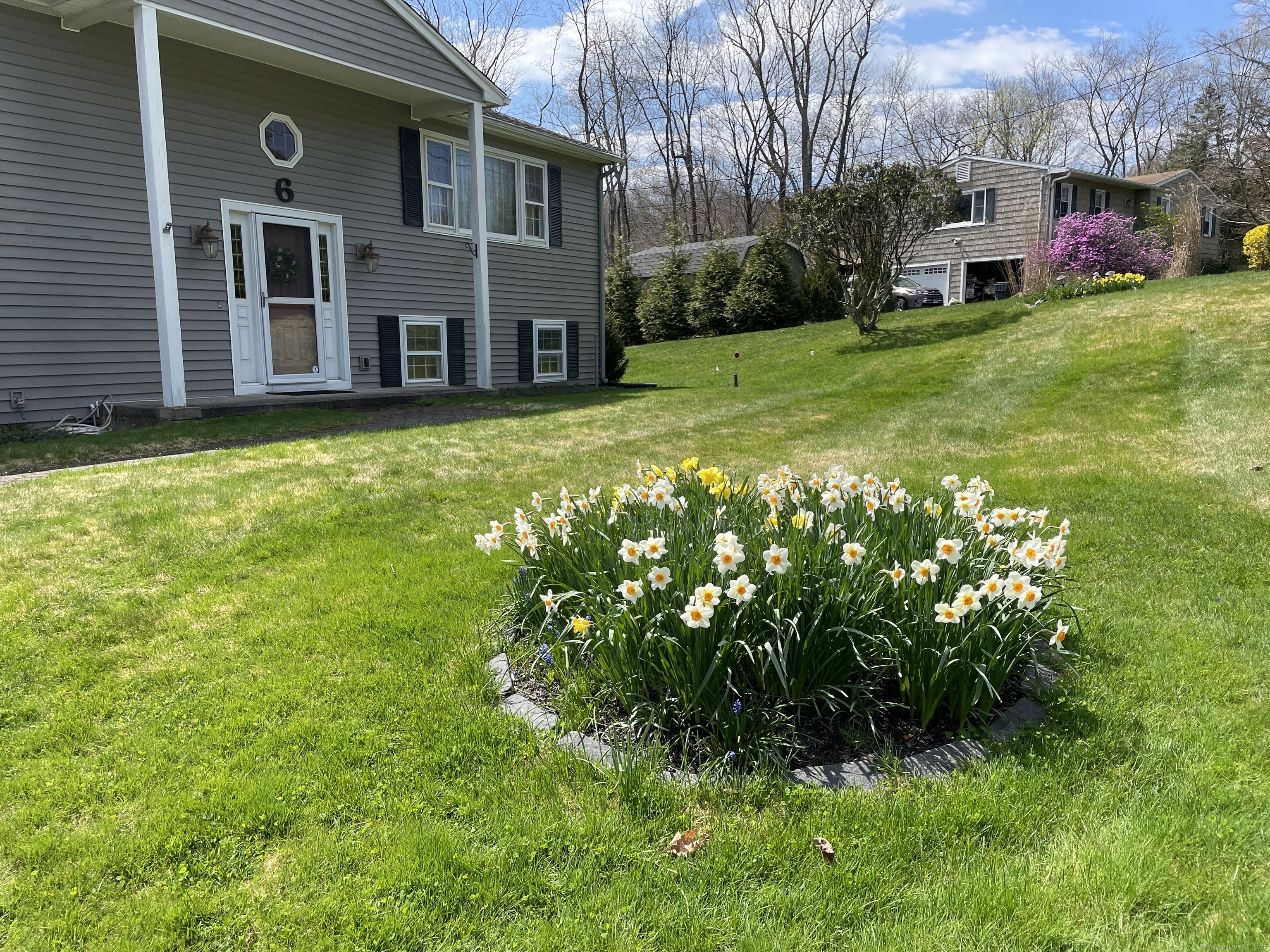 a view of a house with a garden