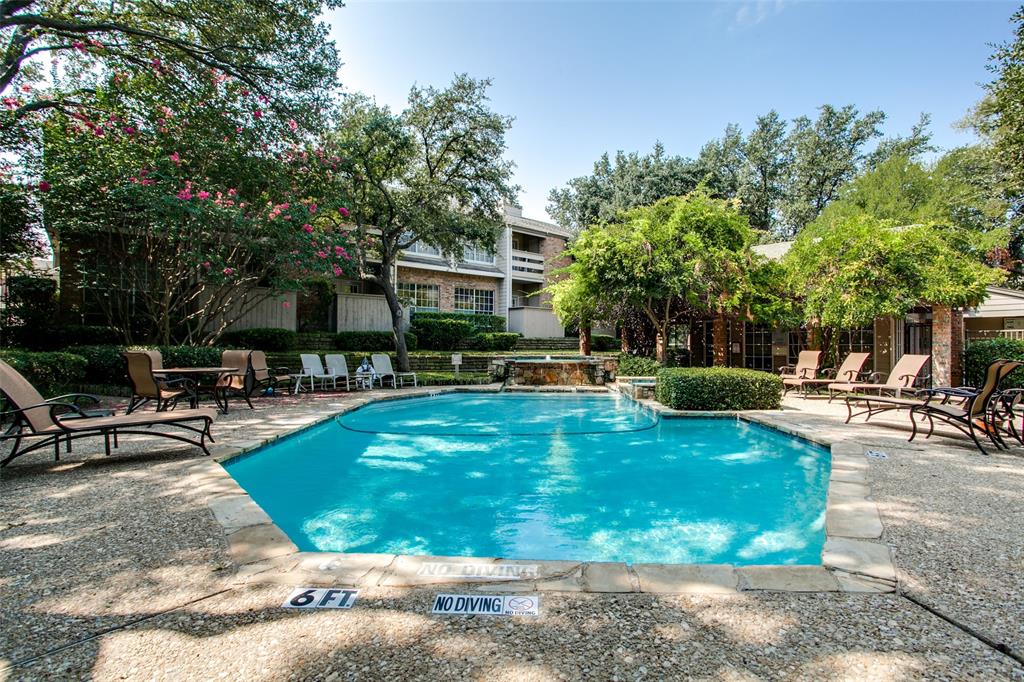 a view of a house with sitting area and a backyard