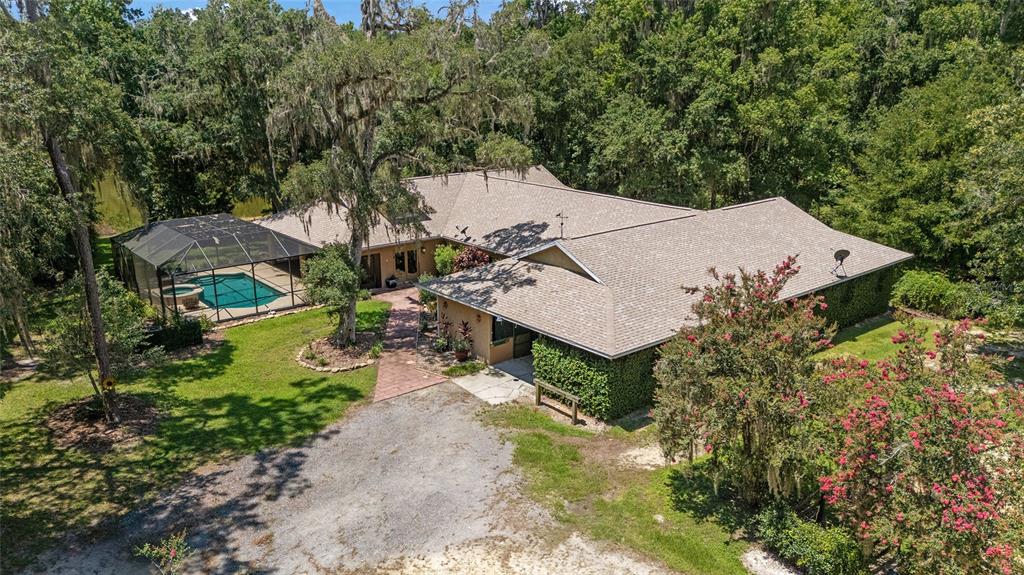 Aerial View of Front of Home , Attached Barn and Pool