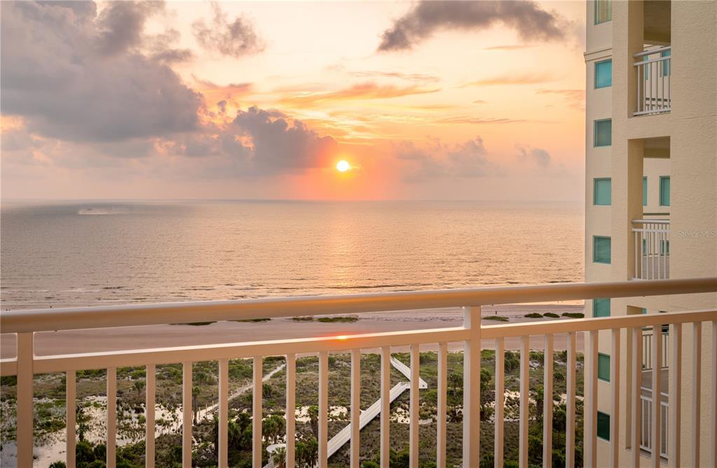 a view of ocean with a building