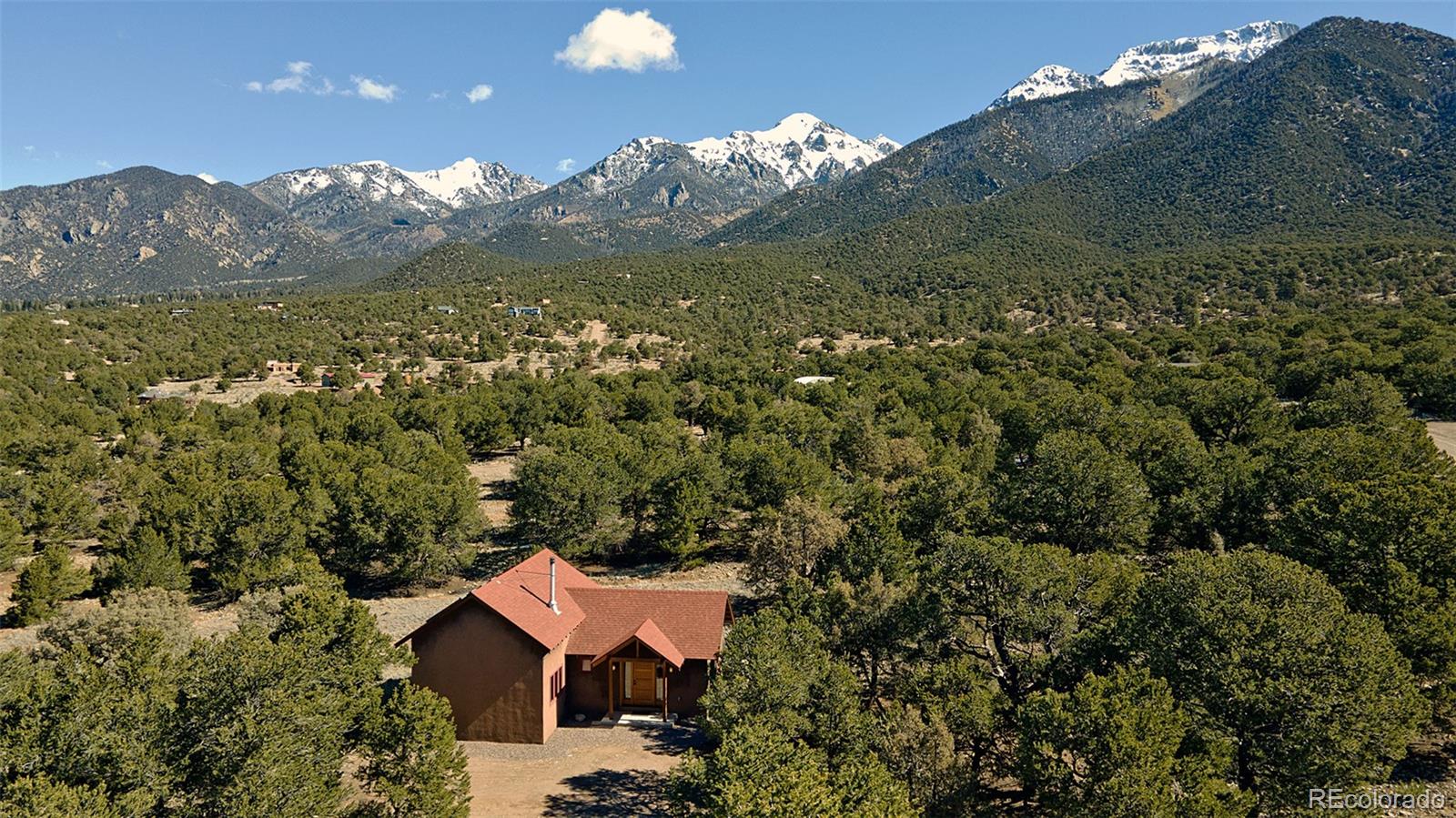 a view of a house with a mountain