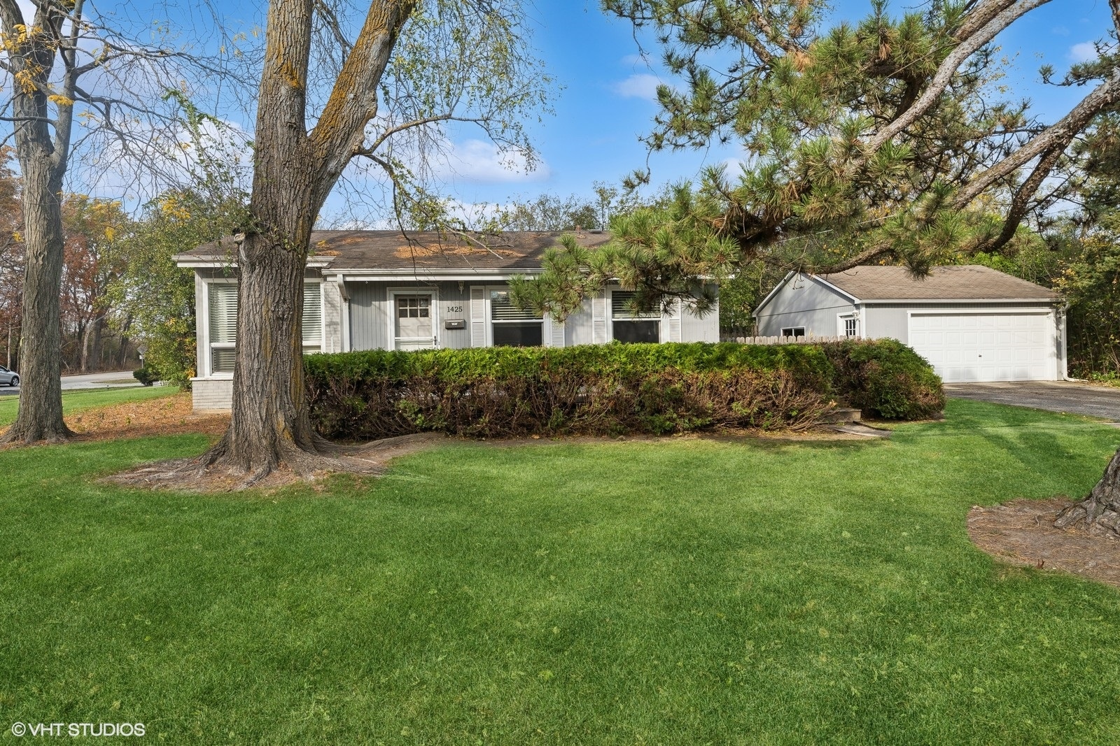 front view of a house with a yard