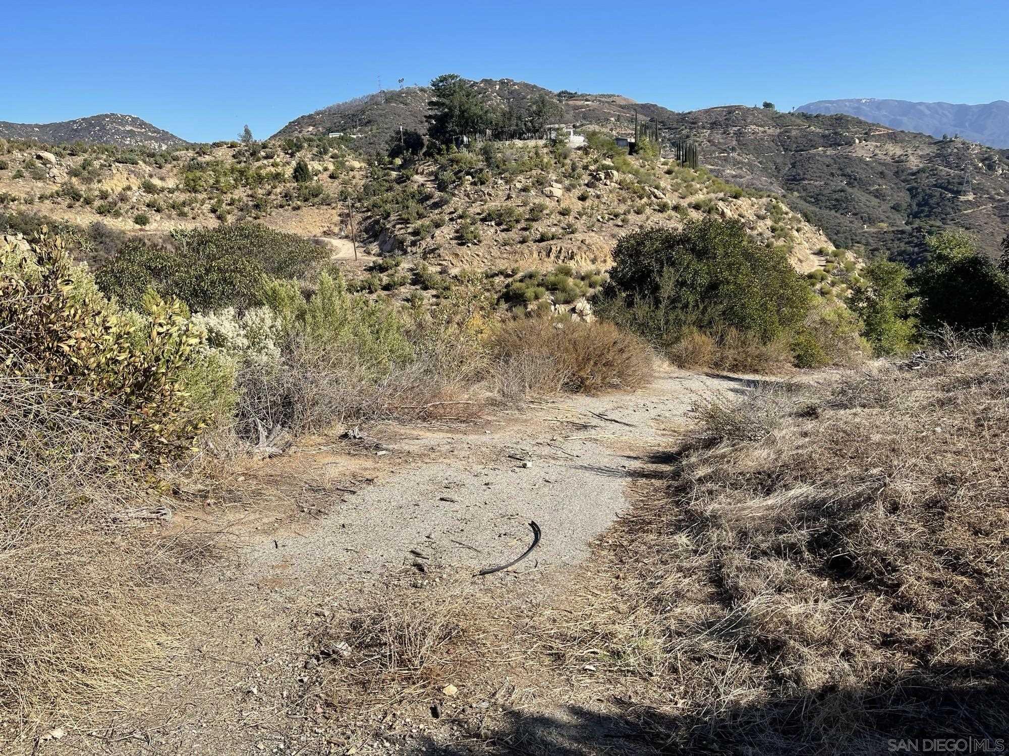 a view of mountain view with mountains in the background