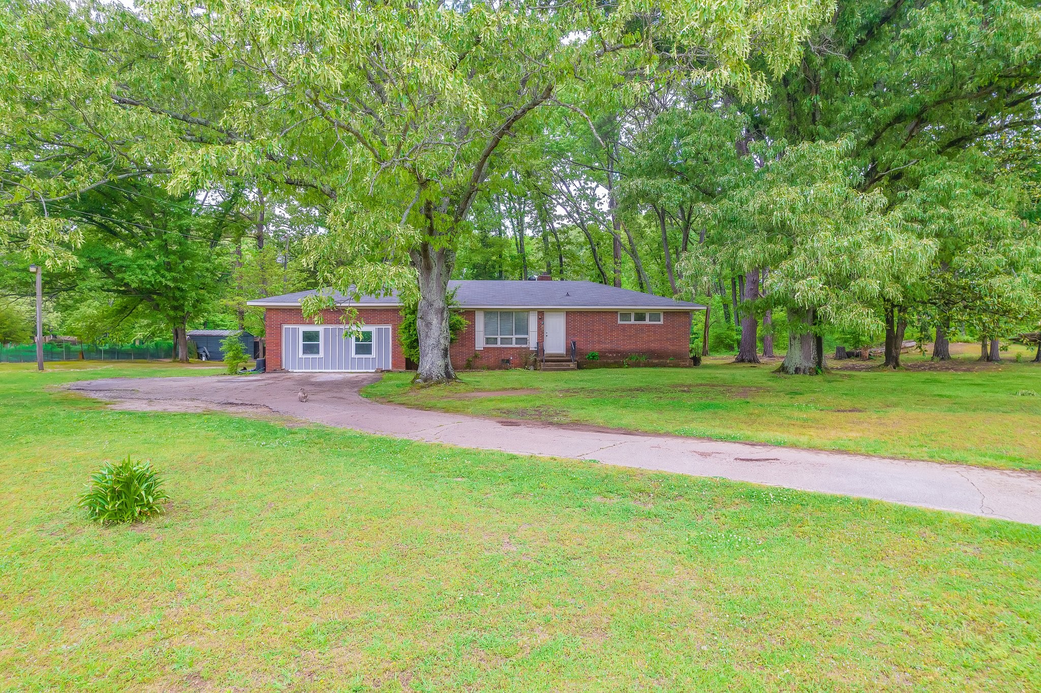 a view of a house with a big yard