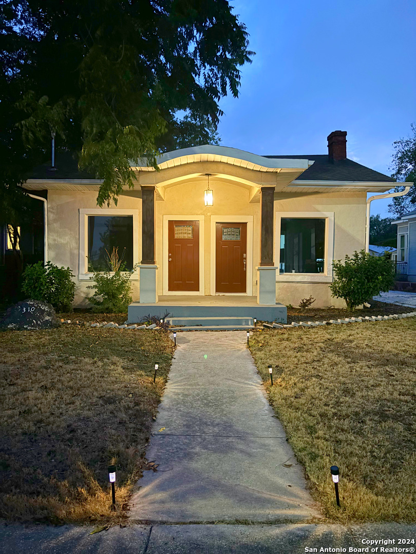 a front view of house with yard