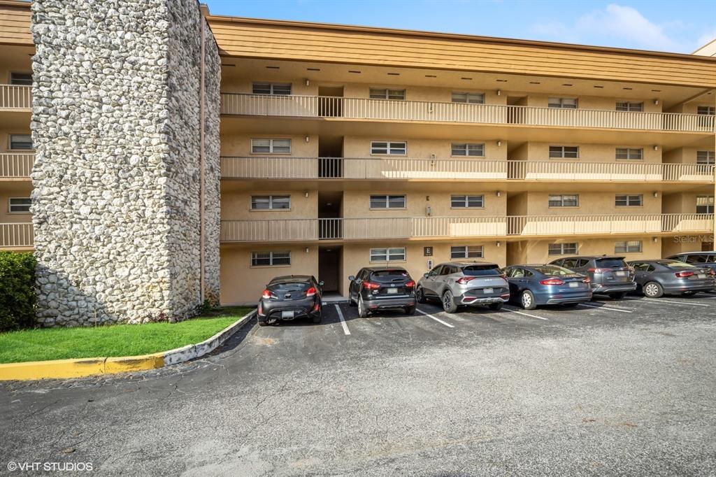 a view of a cars parked in front of a building