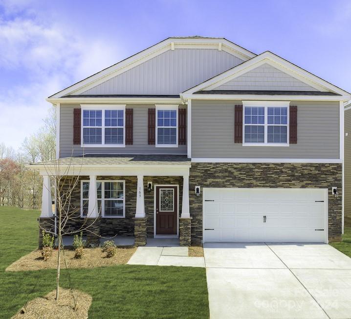 front view of a house with yard