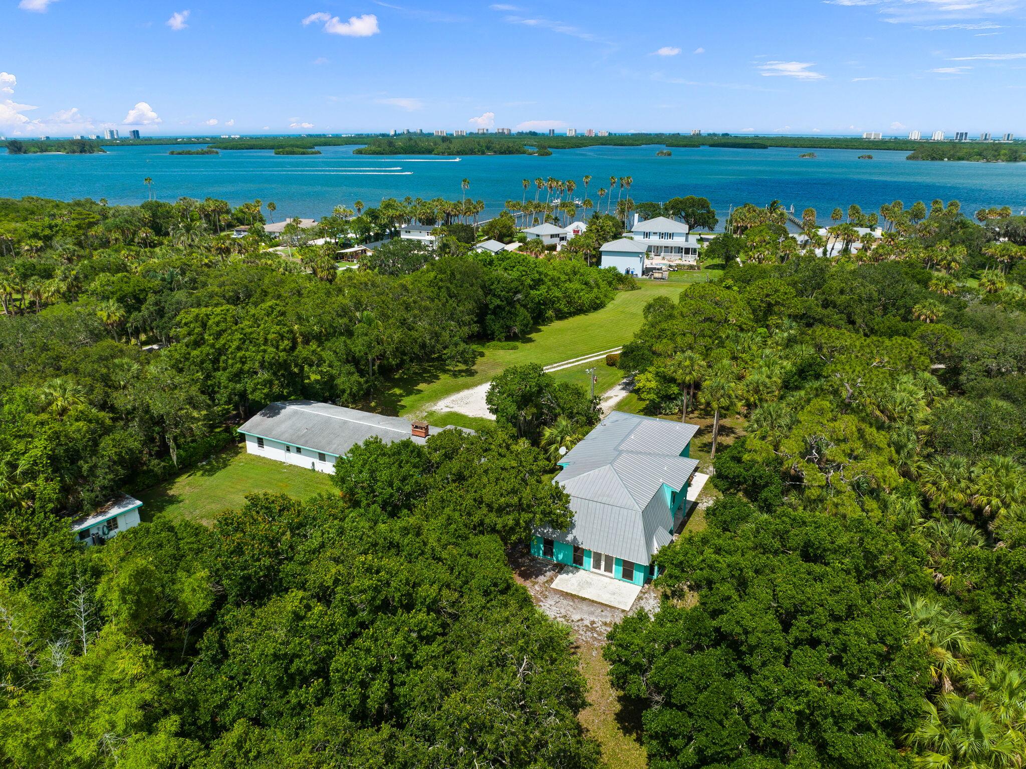 an aerial view of a house with a garden