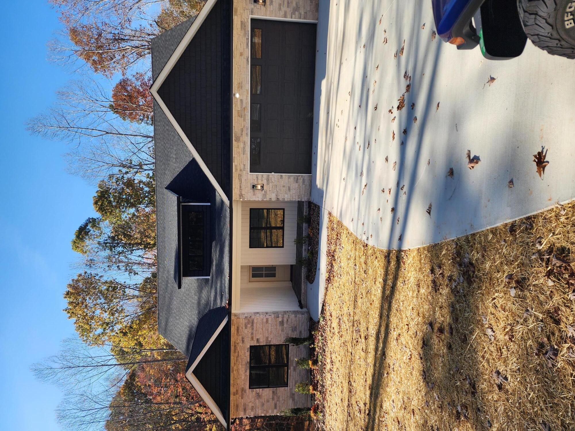 a front view of house with ocean view