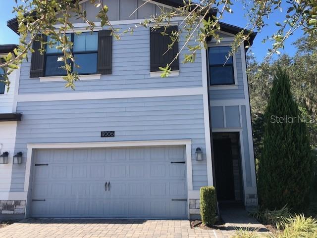 a view of house with outdoor space