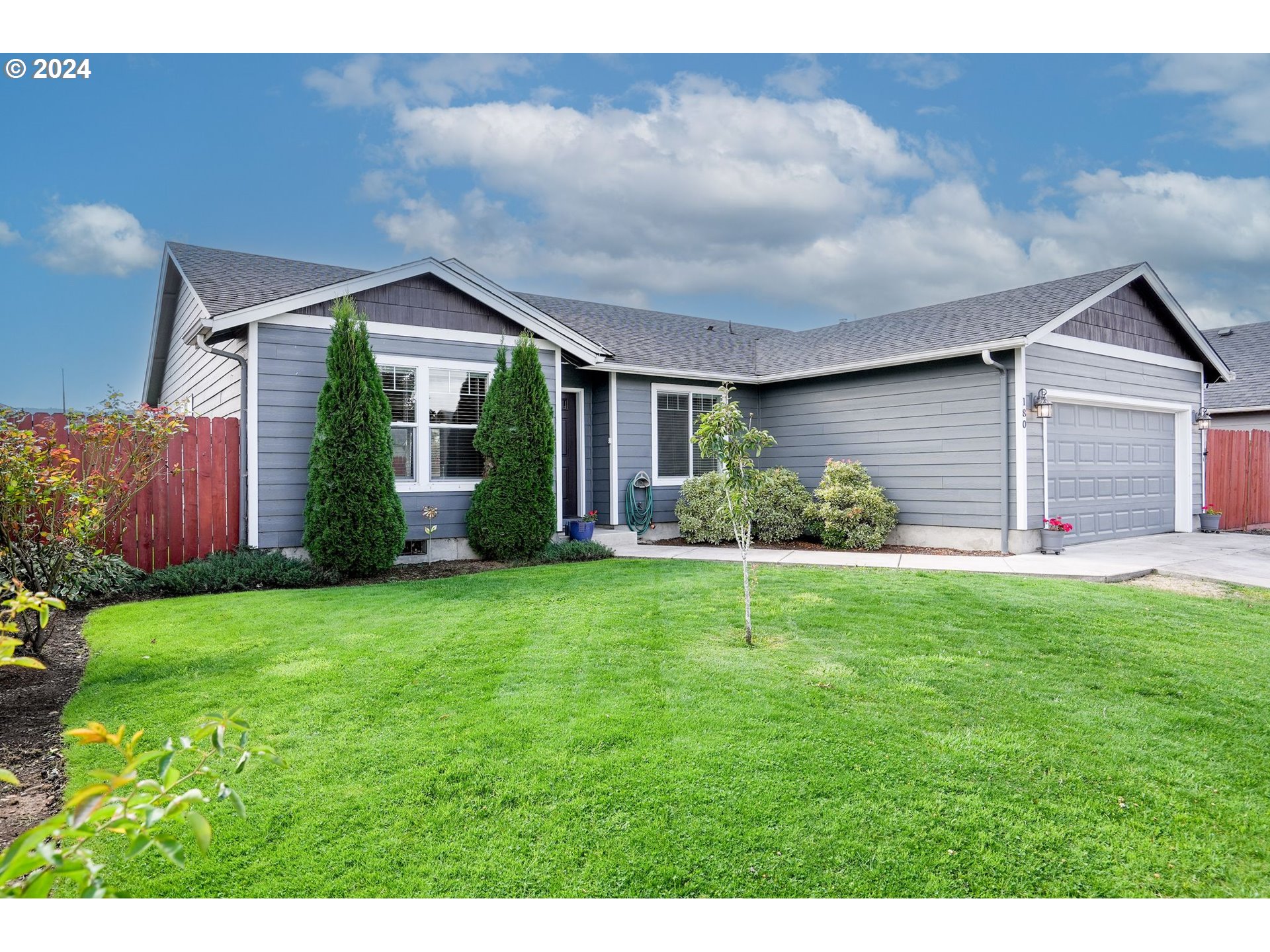 a house view with a garden space