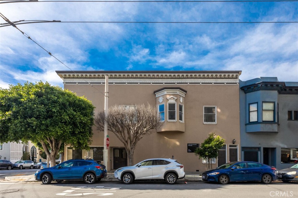 a car parked in front of a building