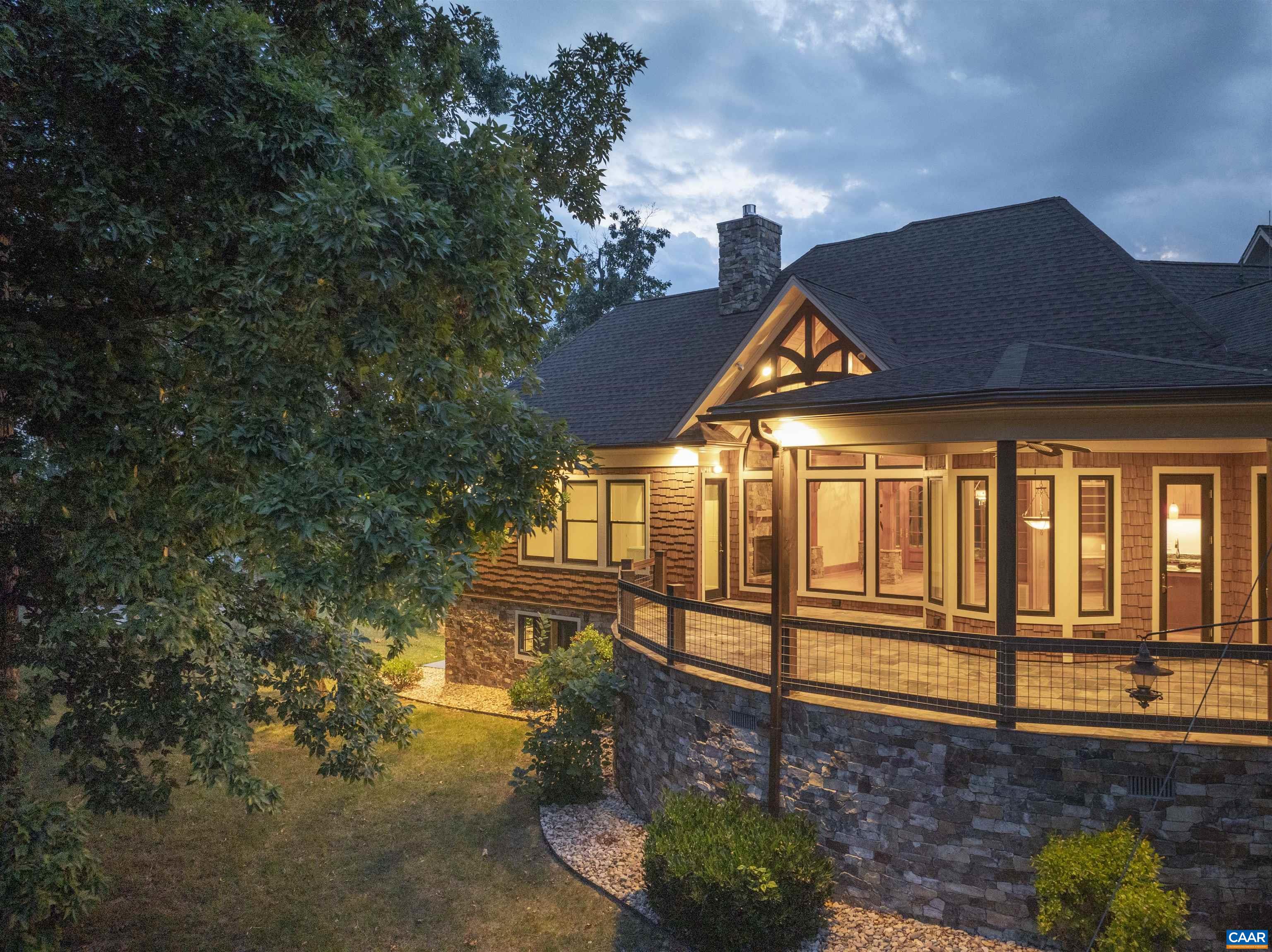 a view of a house with a yard balcony