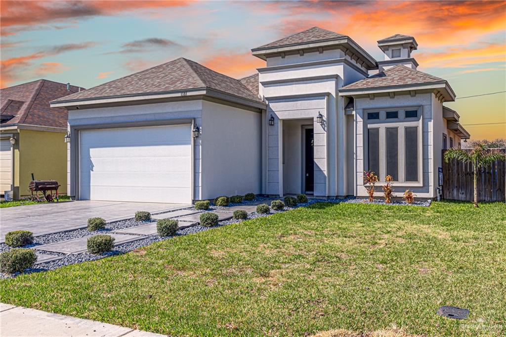 front view of house with a yard