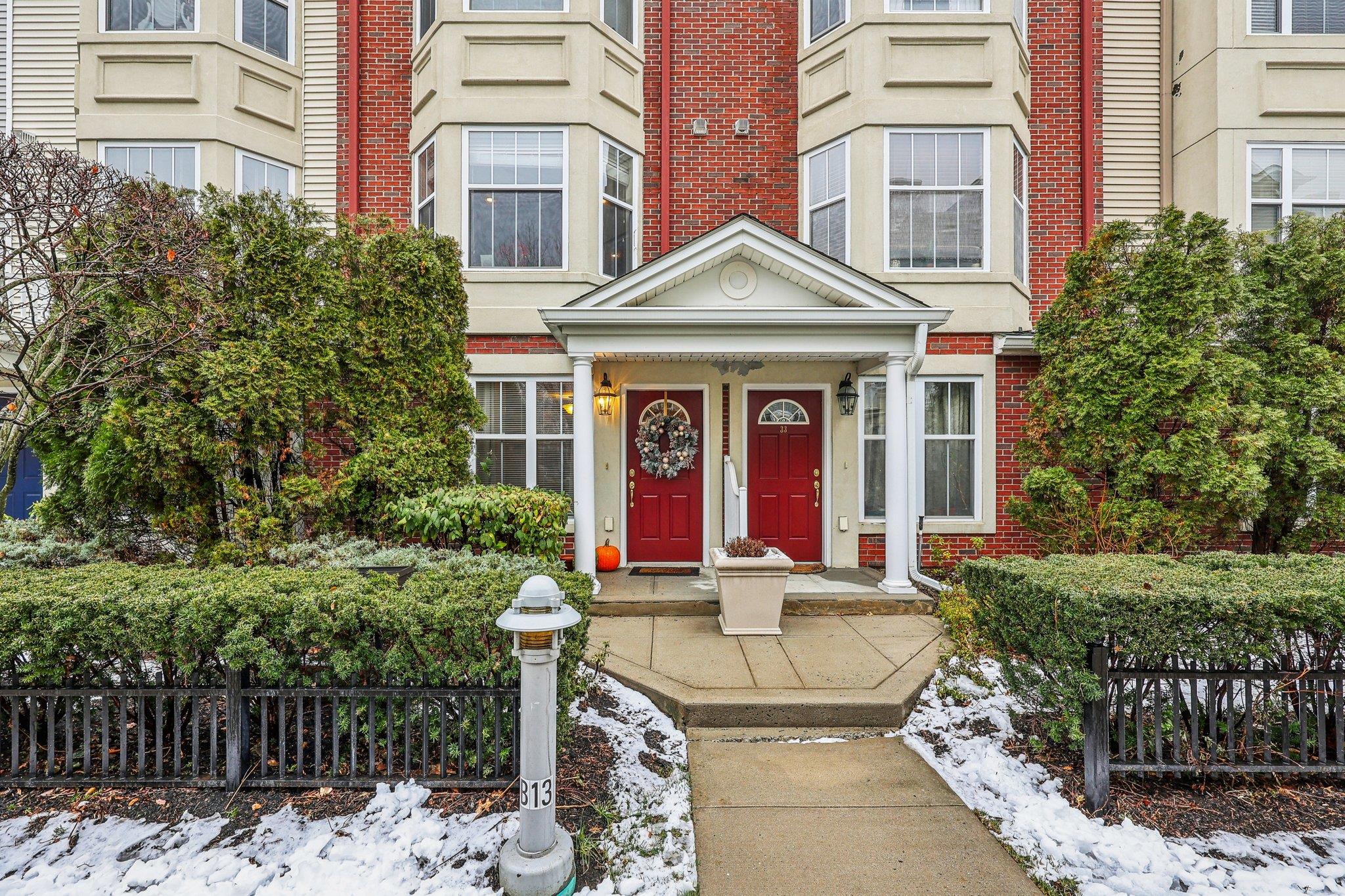 View of snow covered property entrance