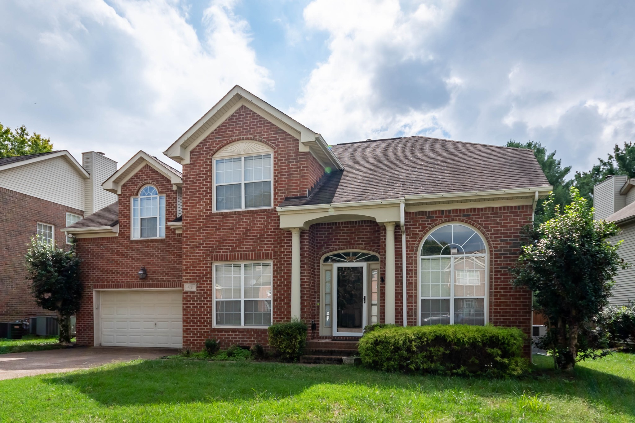 front view of house with a yard