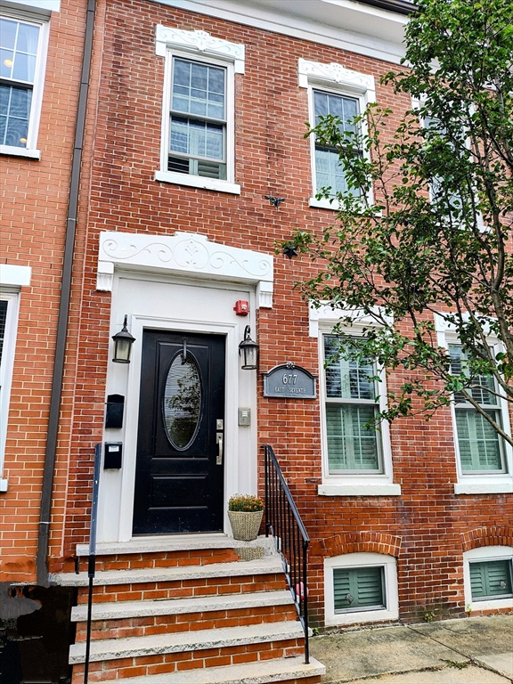 a front view of a house with a fireplace