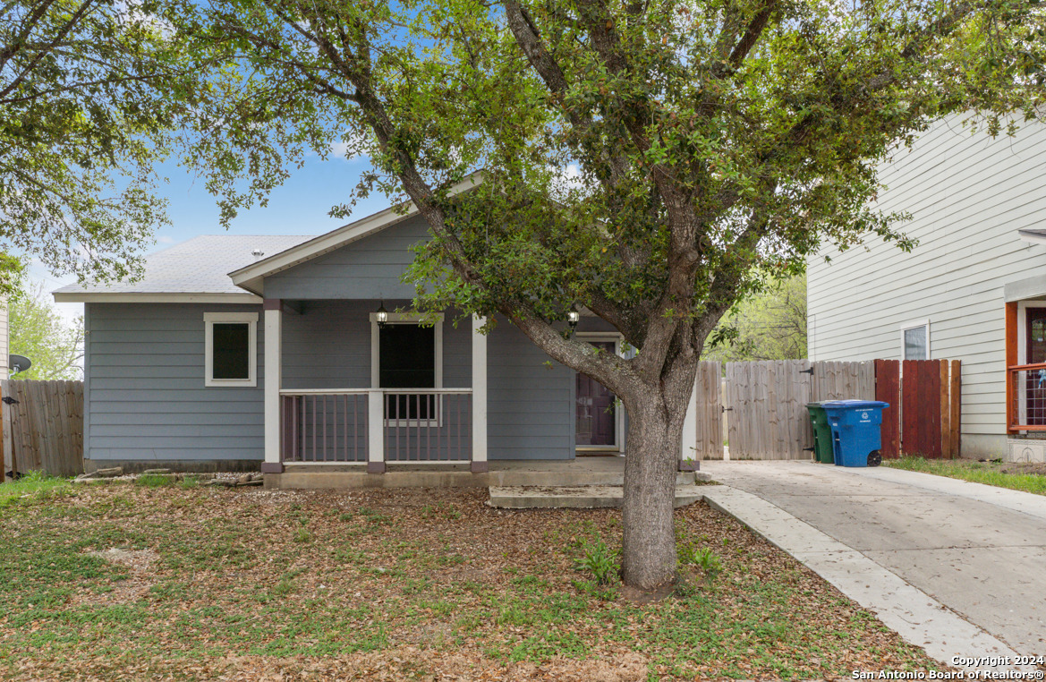 a house with trees in front of it