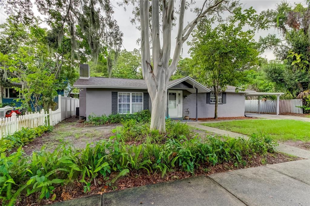 front view of a house with a yard