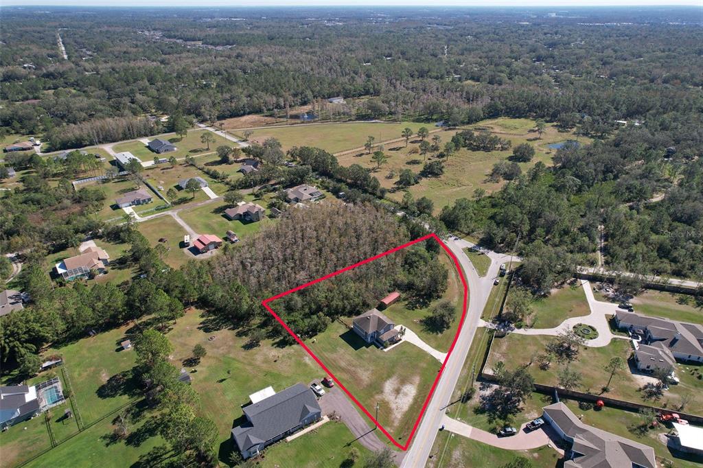 Aerial view of home, property & Quail Hollow area!