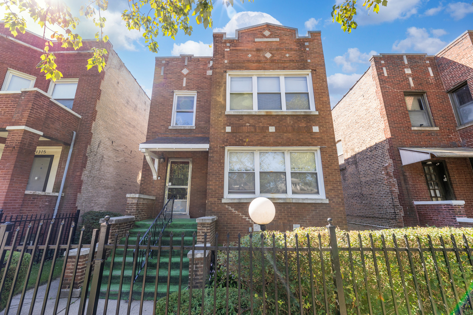 a front view of a multi story residential apartment building