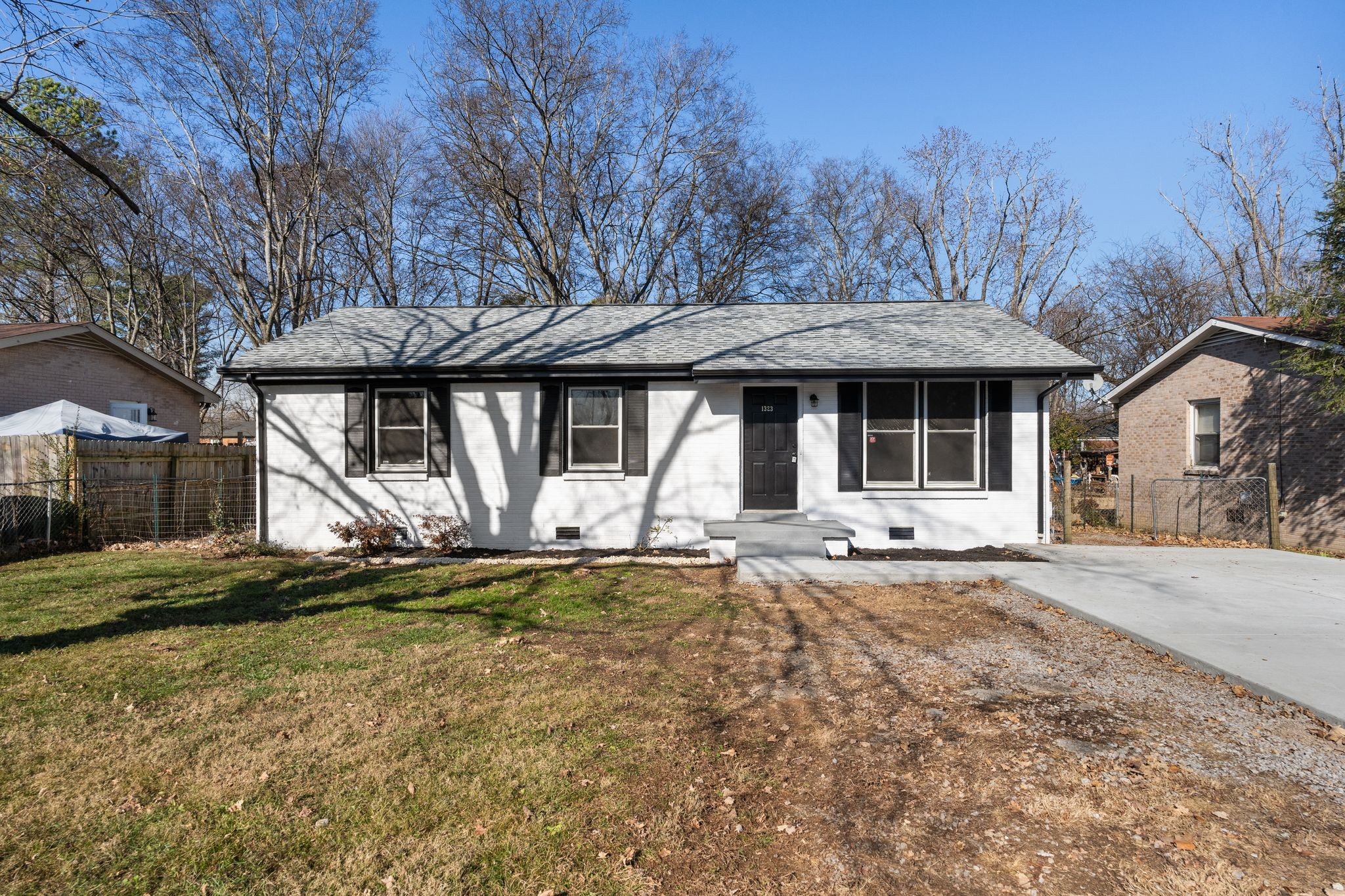 a house with trees in front of it