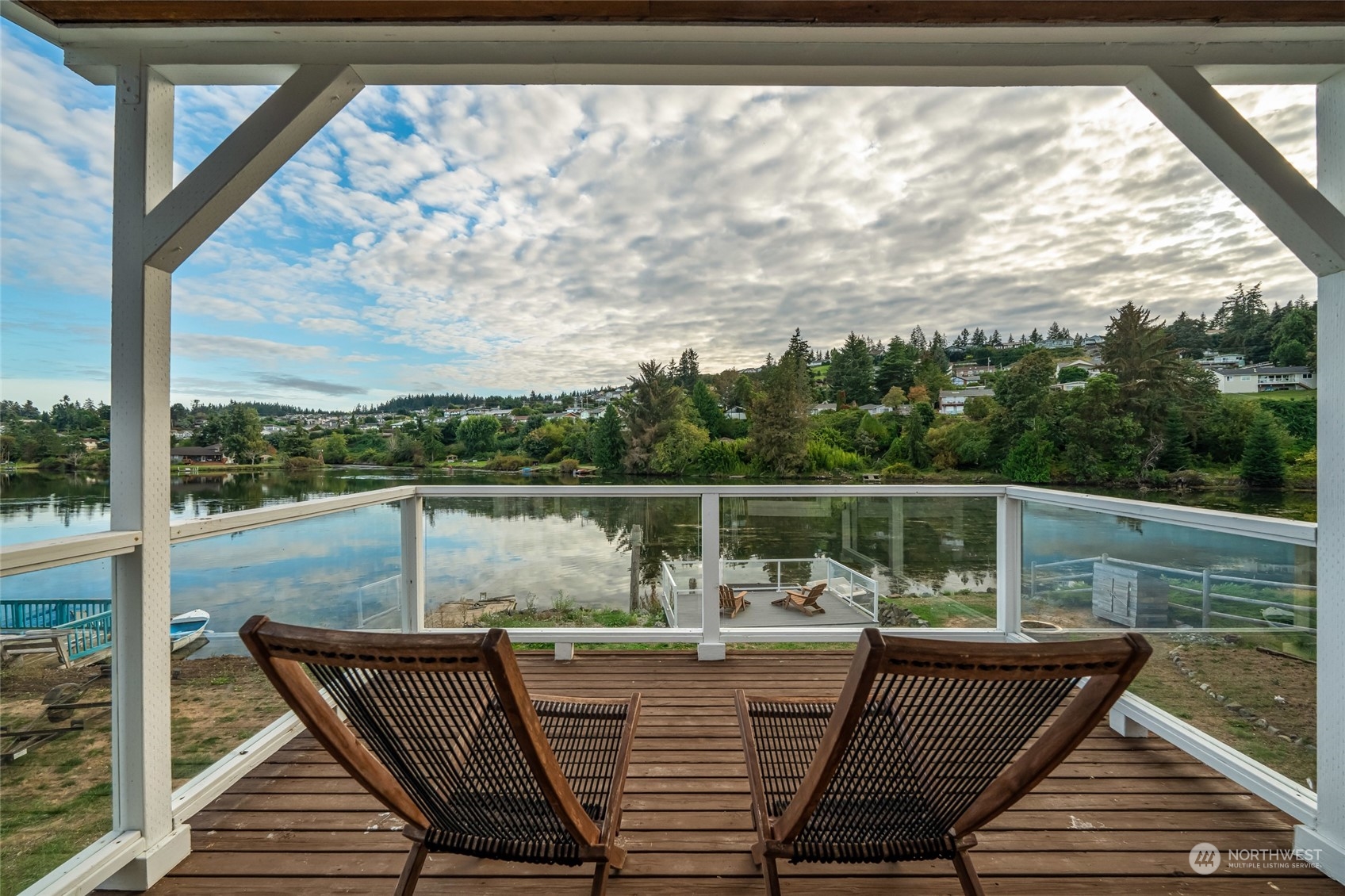 a view of roof deck with furniture