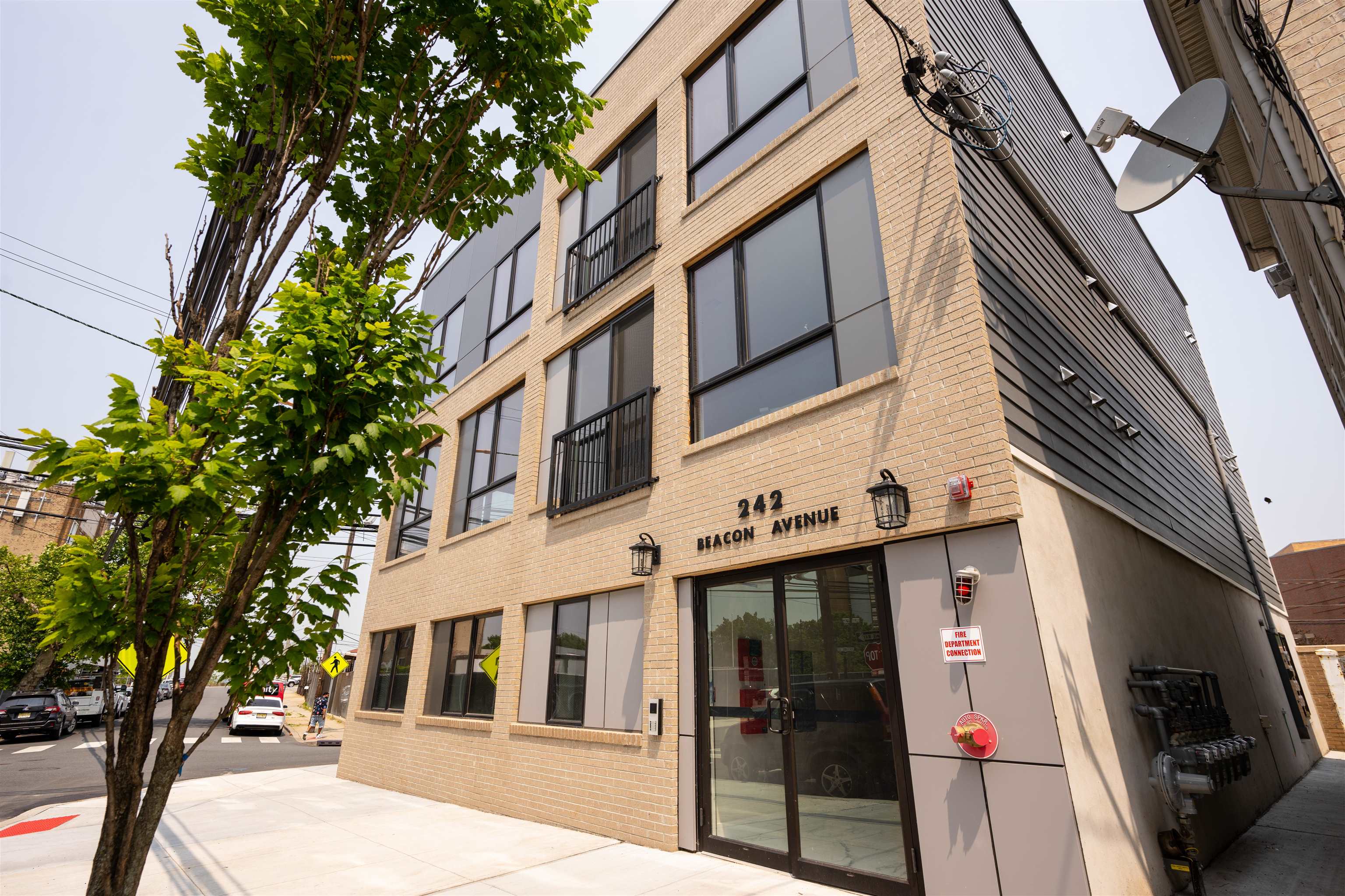 a view of a building with a tree