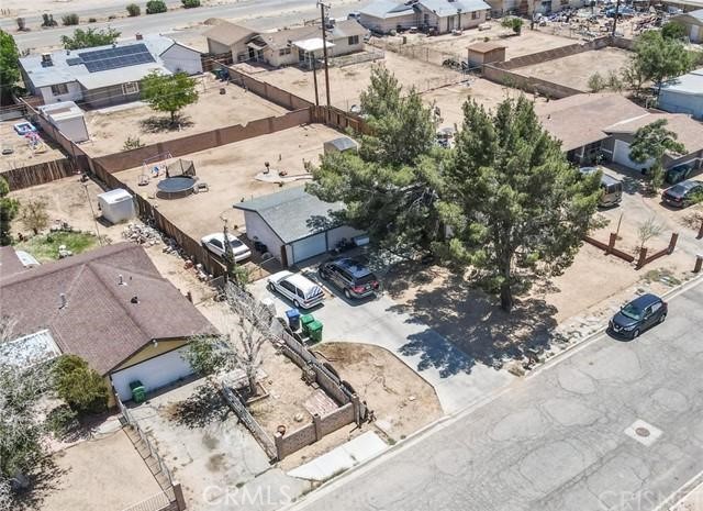 an aerial view of residential house with outdoor space