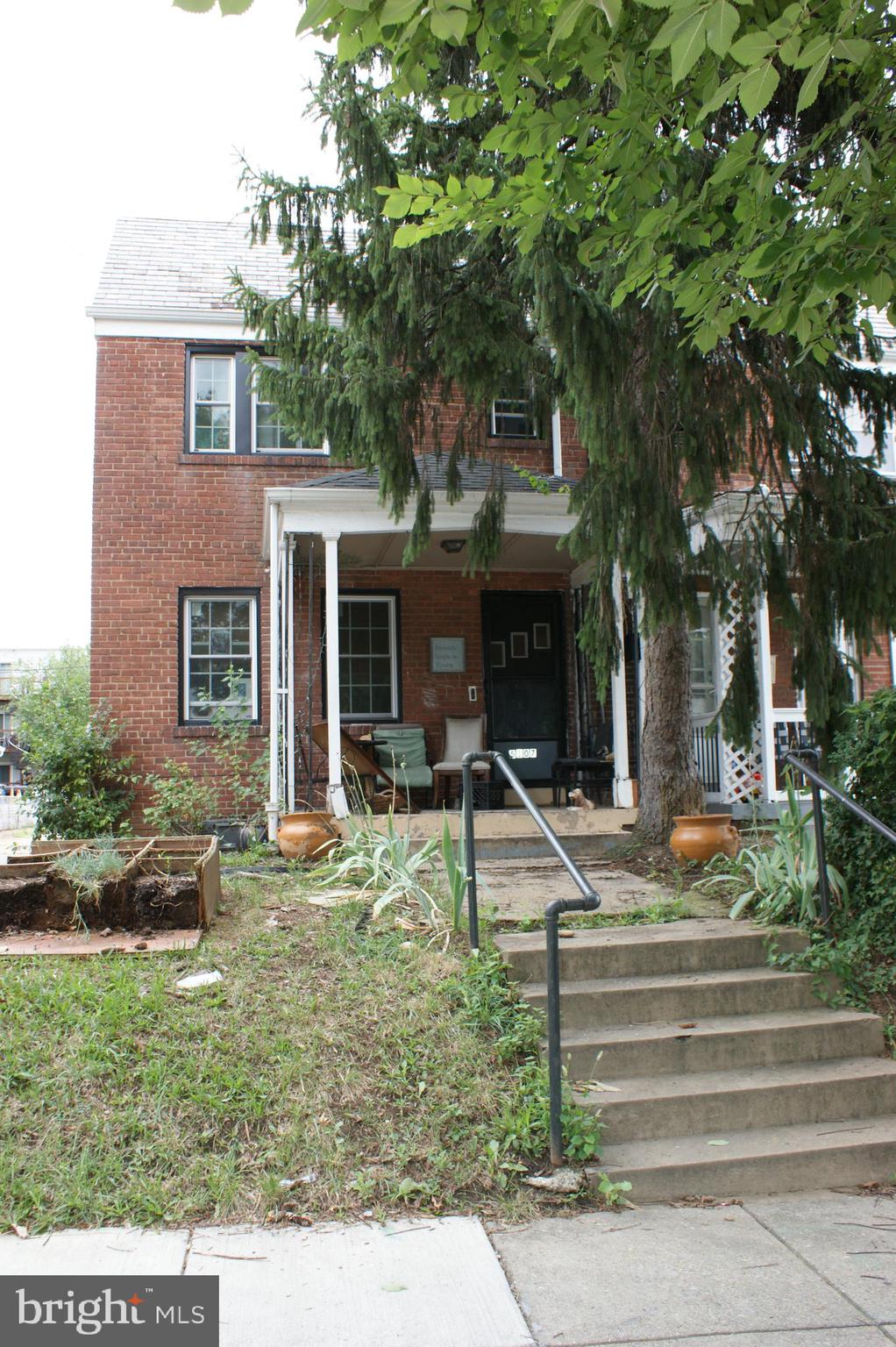 front view of house with a yard