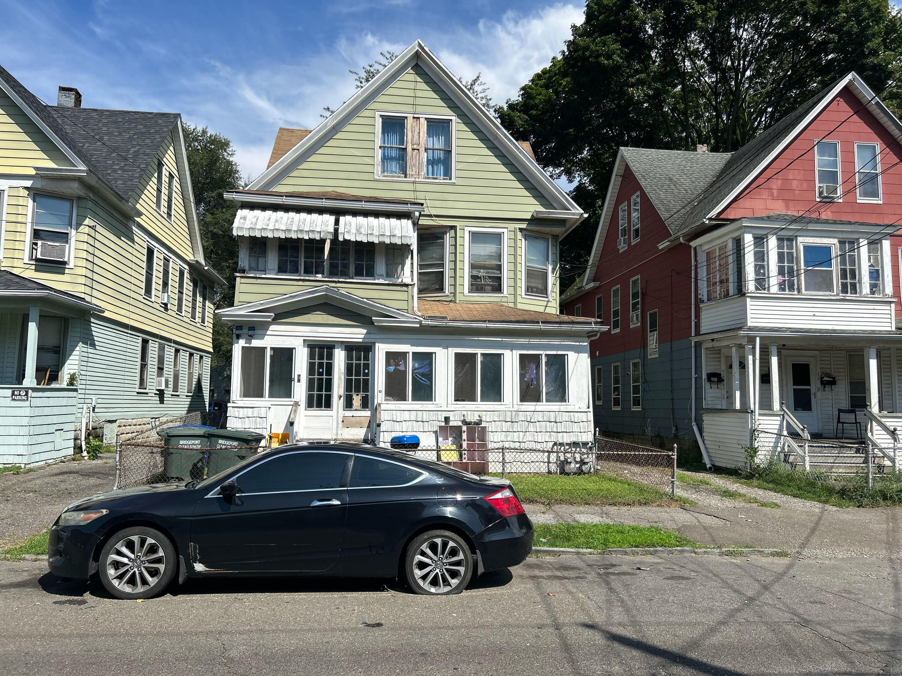 a car parked in front of a house