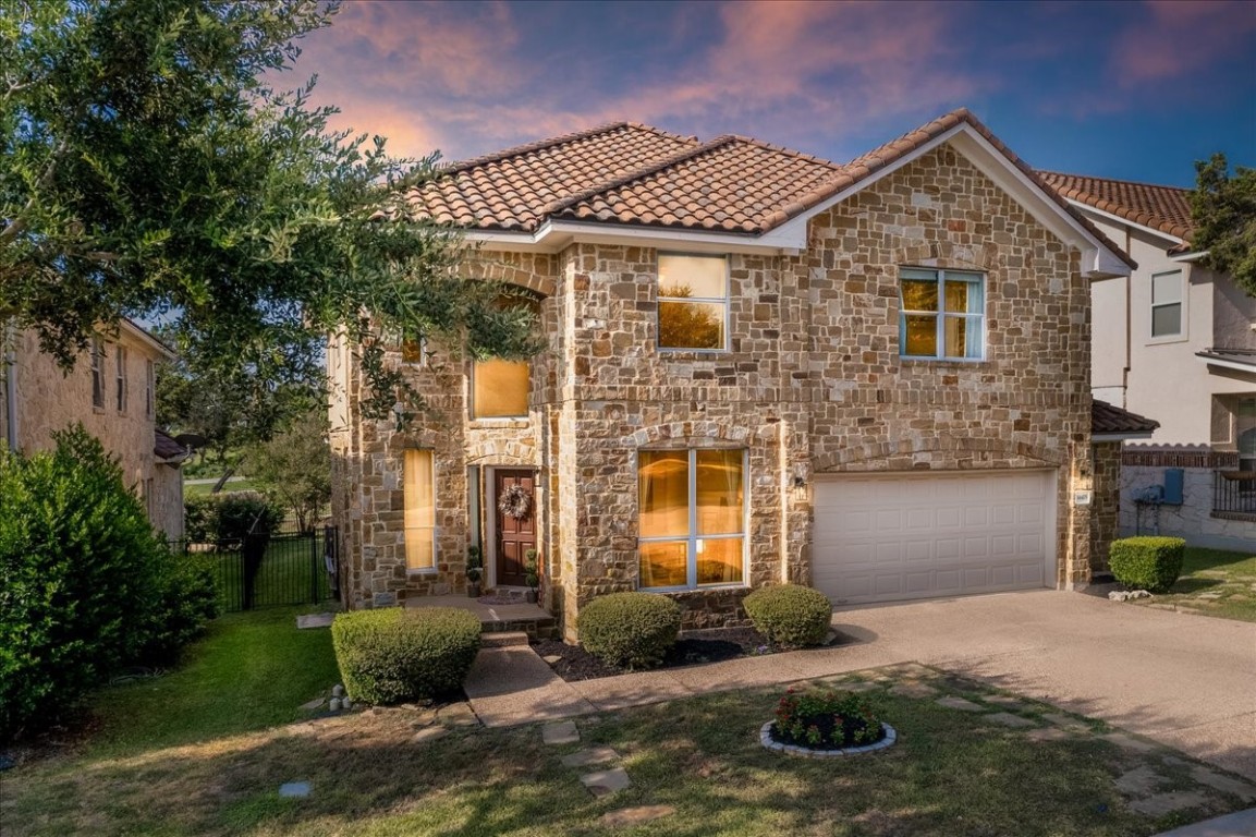 Twilight view of the front of your home