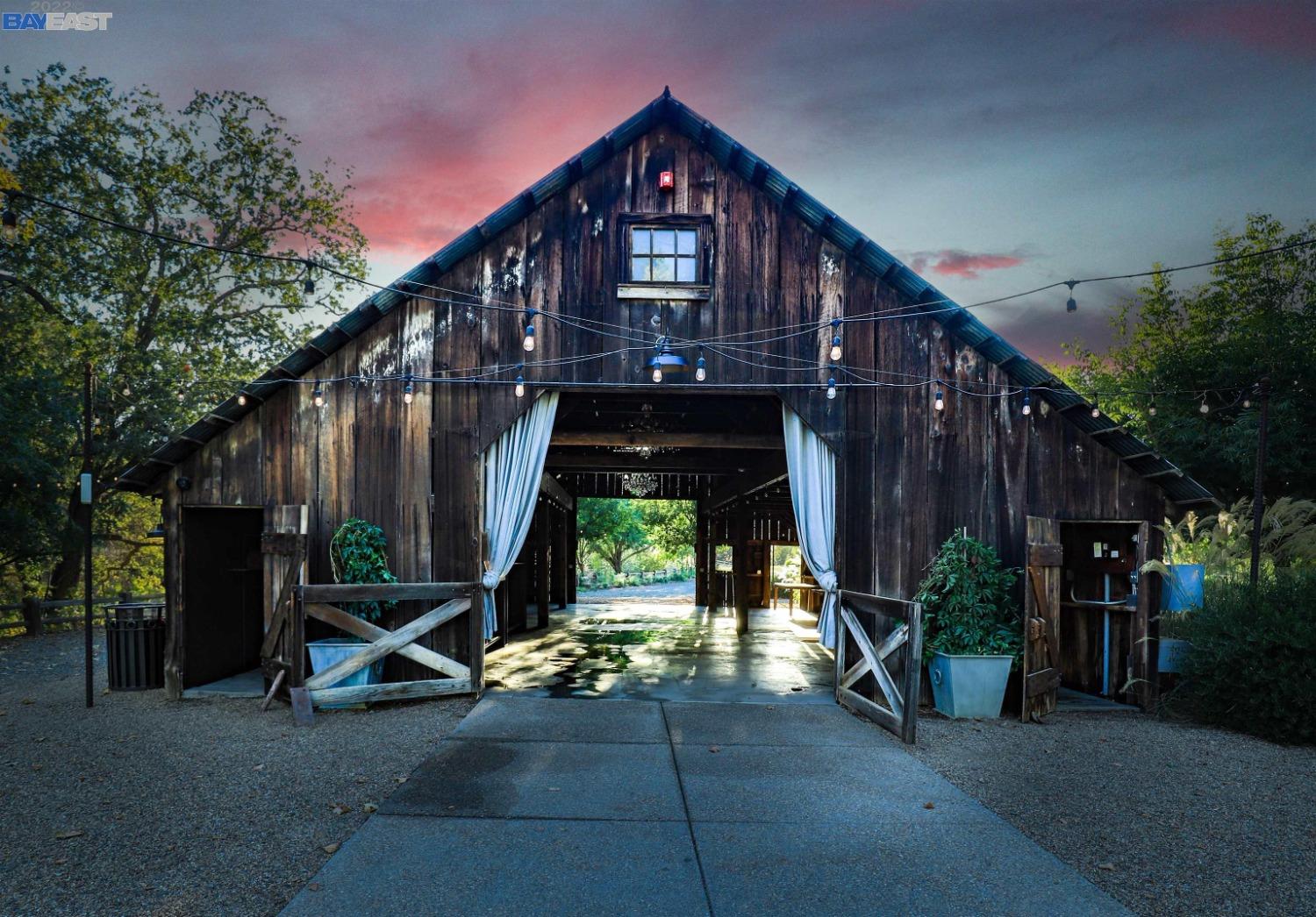 Event barn - permitted for public gatherings with fire sprinklers, lights and concrete floor.