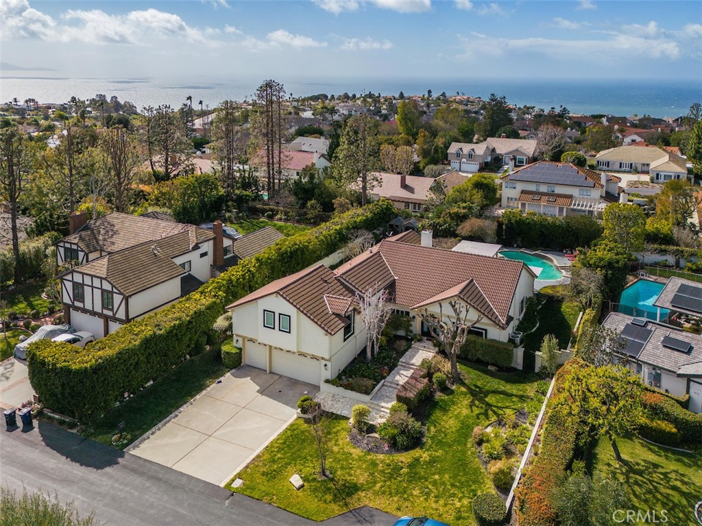 an aerial view of a house with a garden