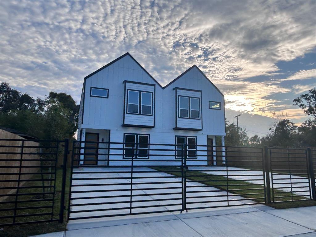 a house view with a backyard space