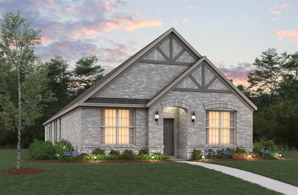 a front view of a house with a yard and outdoor seating