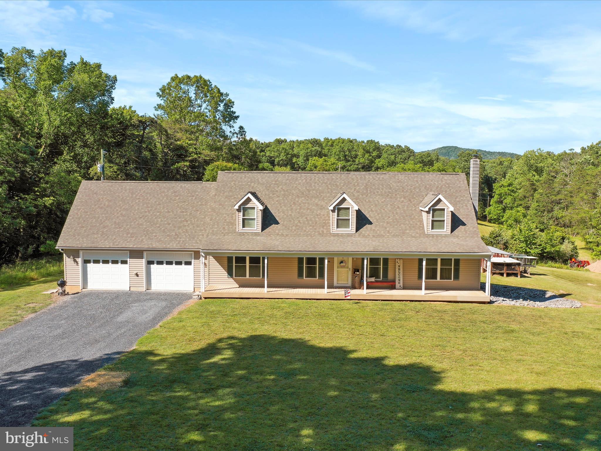 front view of a house with a yard