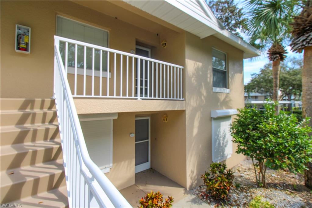 Entrance to property with a balcony