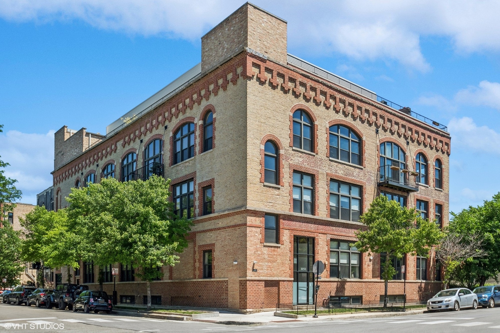 a front view of a building with street view