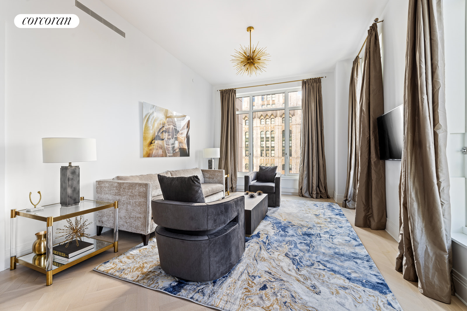 a living room with furniture and a window