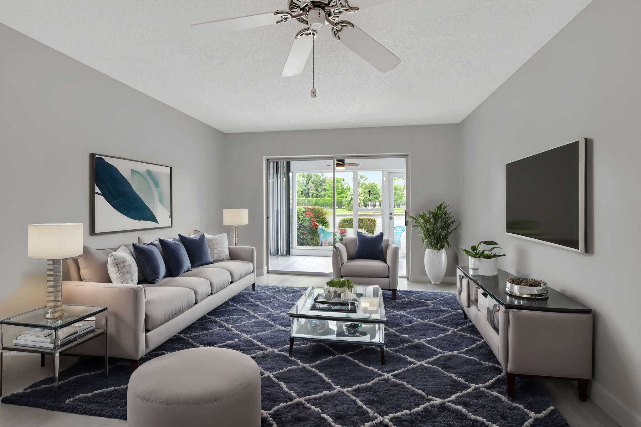 a living room with furniture and a flat screen tv