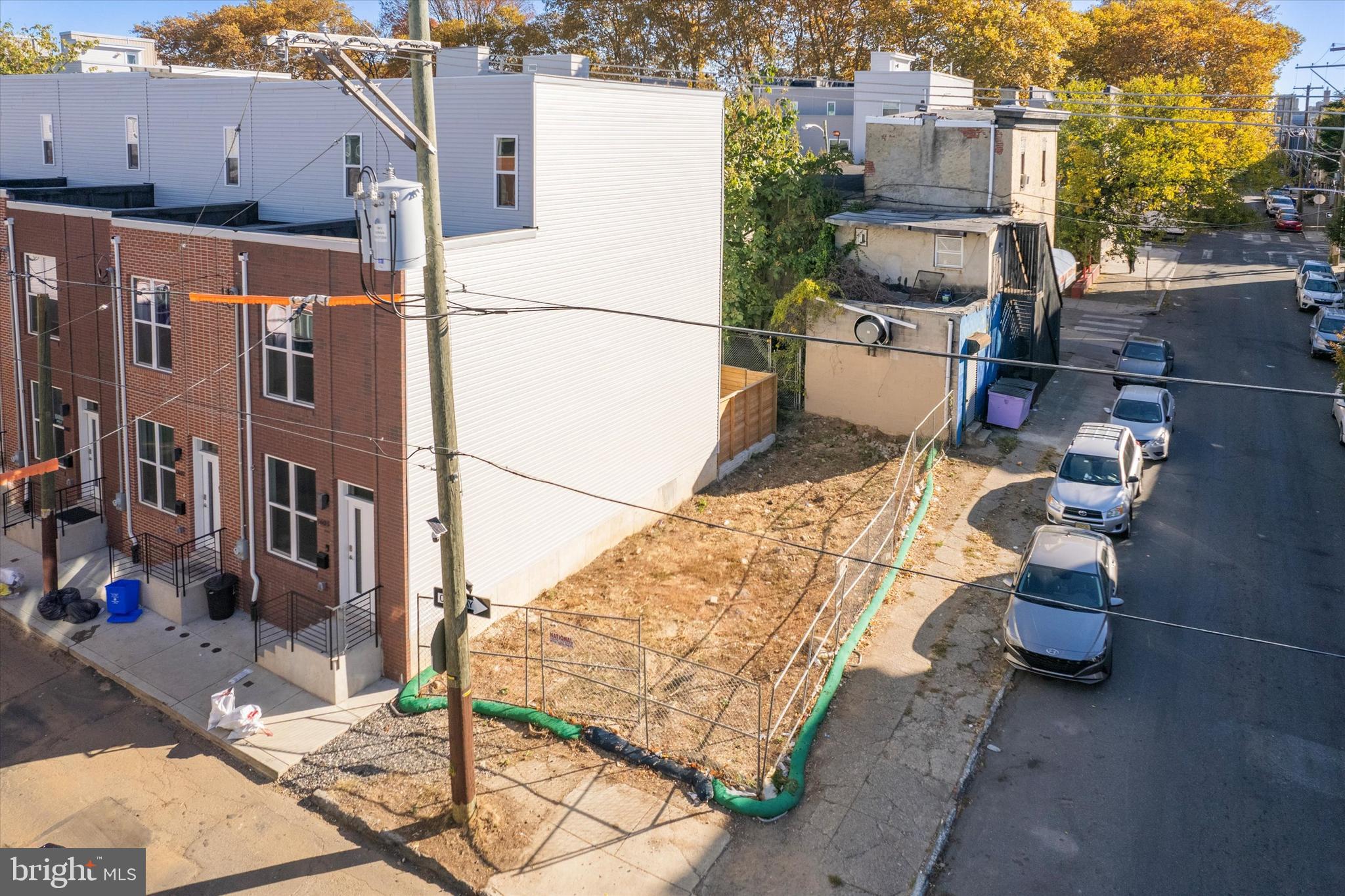 a aerial view of a house with basket ball court