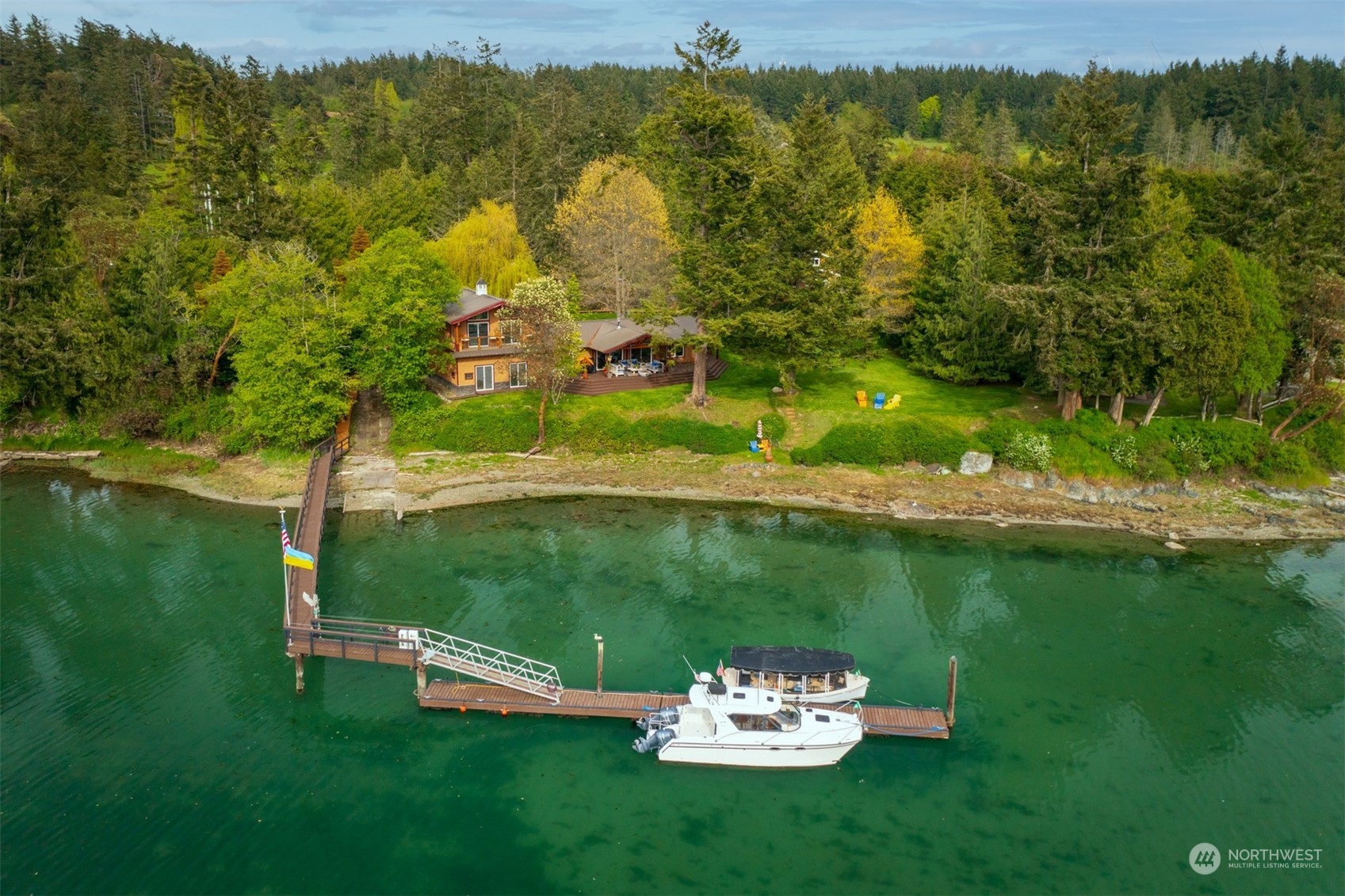 a view of a lake with a yard