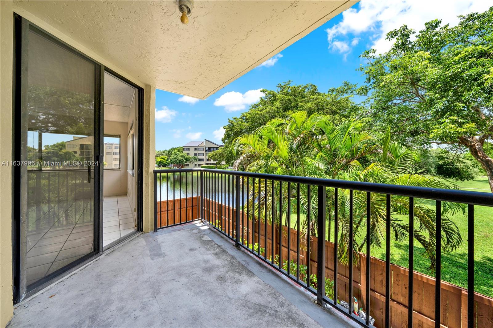 a view of balcony with furniture