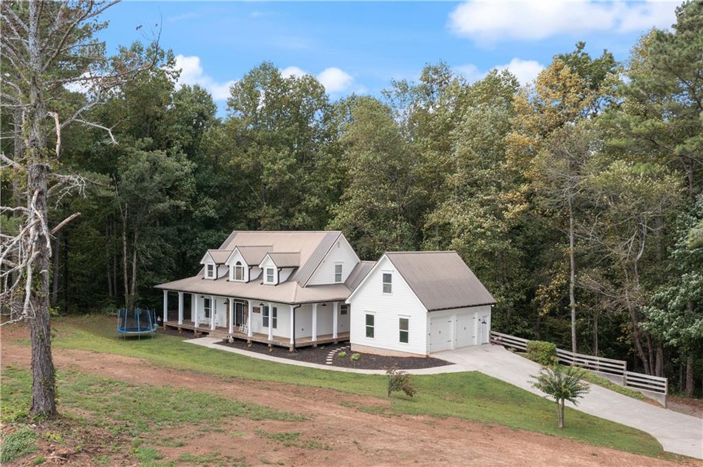 an aerial view of residential house and space