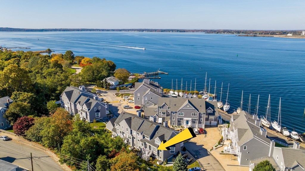 an aerial view of houses with outdoor space