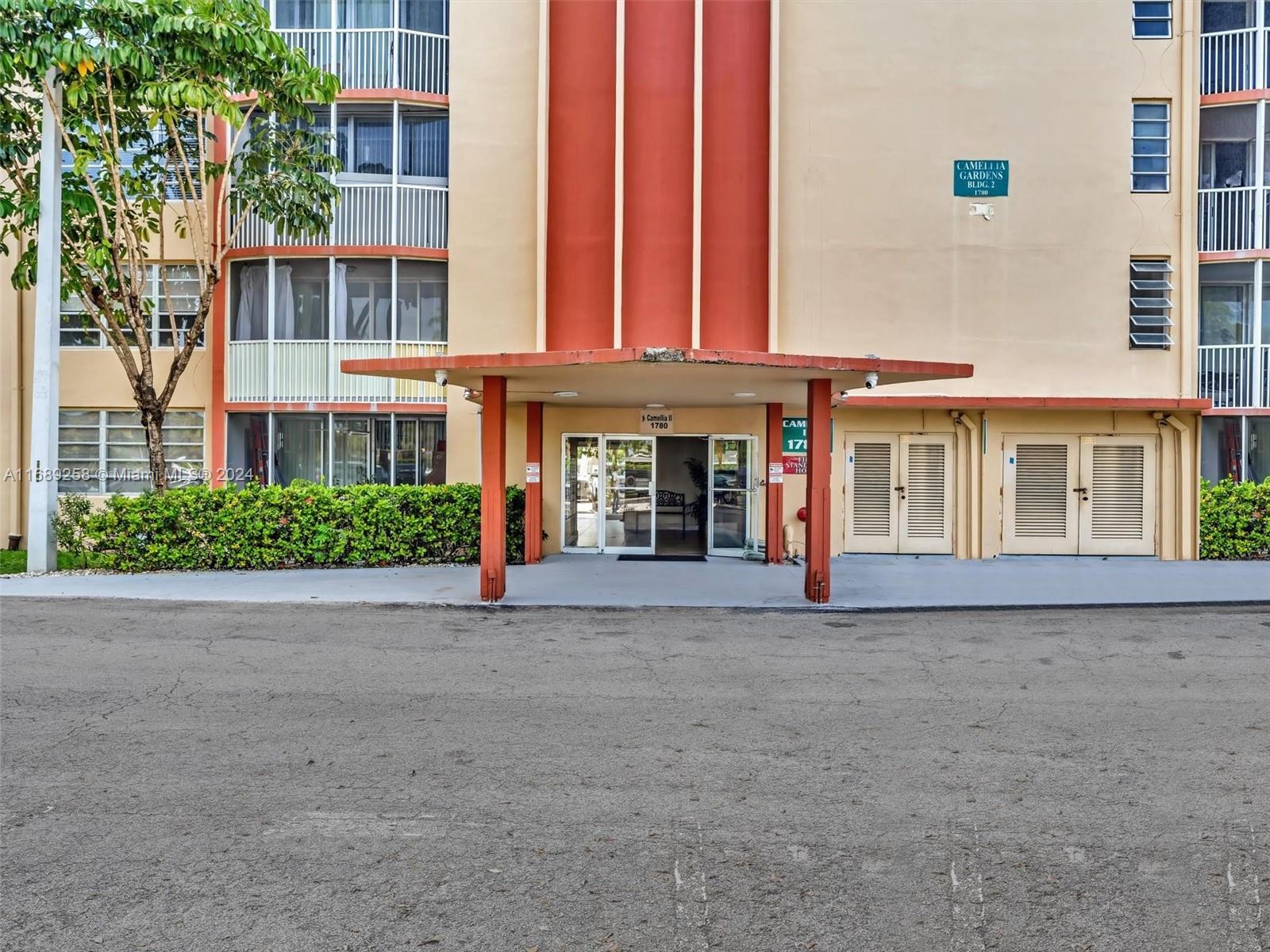 front view of a building with a street